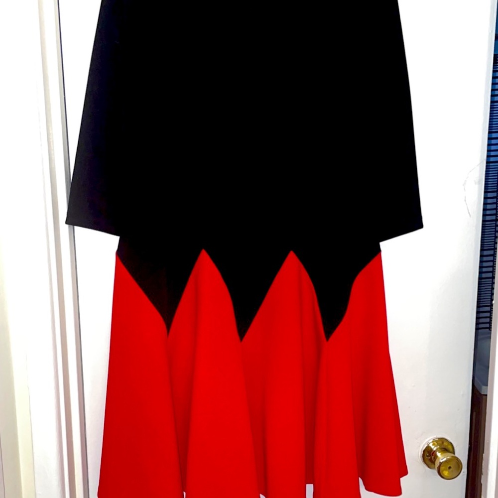 Black and red dress. 3/4 sleeve. Just below knee.